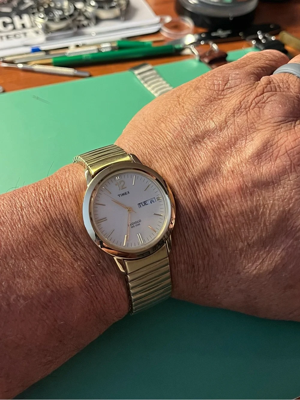 Timex Gold Tone Watch with White Dial and Day-Date